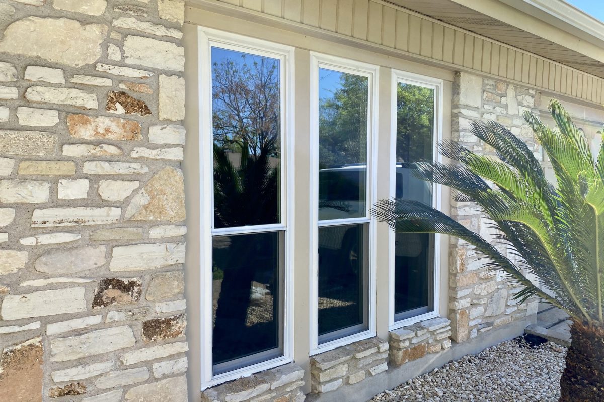 IMG_3072 Window replacement professionals installing a modern window