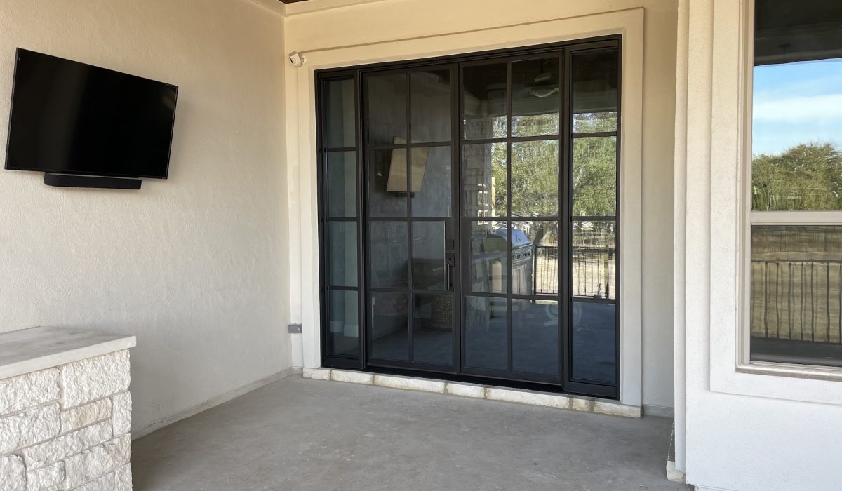 IMG_1728-preview Technician performing door replacement in a Round Rock home